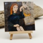 Malowany kafelek W złotej klatce